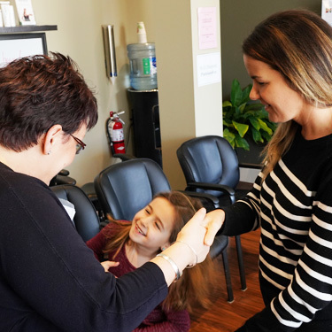 People in chiropractic office reception