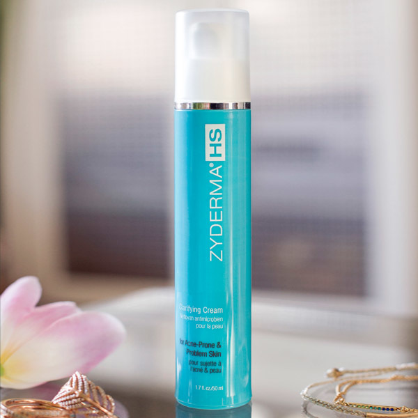 Blue bottle of Zyderma product