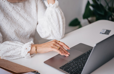 Woman searching on her laptop