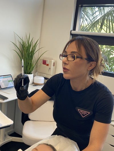 Manal injecting Fillers