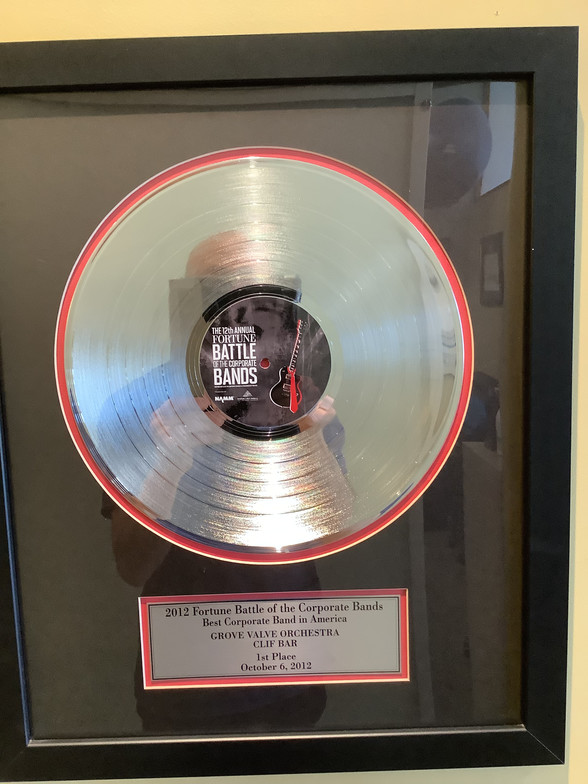 2012 The Platinum Record in our office from Clif Bar's winning Best Corporate Band In America at the Rock 'N Roll Hall of Fame