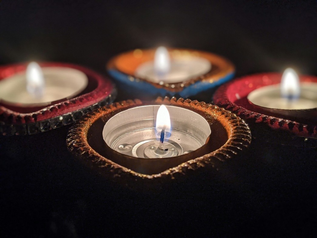 Warm tealight candles providing a sense of calm in a stressful holiday period.