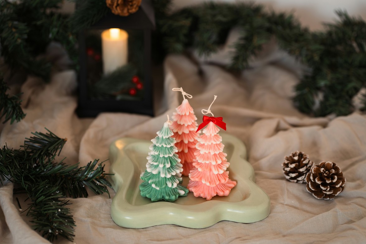 Christmas tree candles on a decorative Christmas table