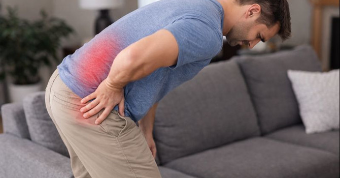 Back Pain When You Straighten Up: Common Reasons It Happens image