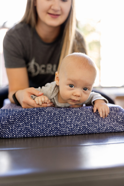 pediatric chiropractor working on an infant with colic 