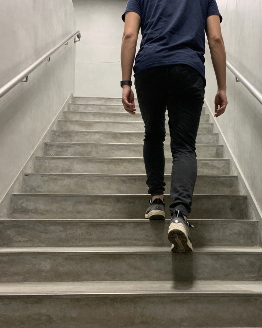A guy going up the stairs