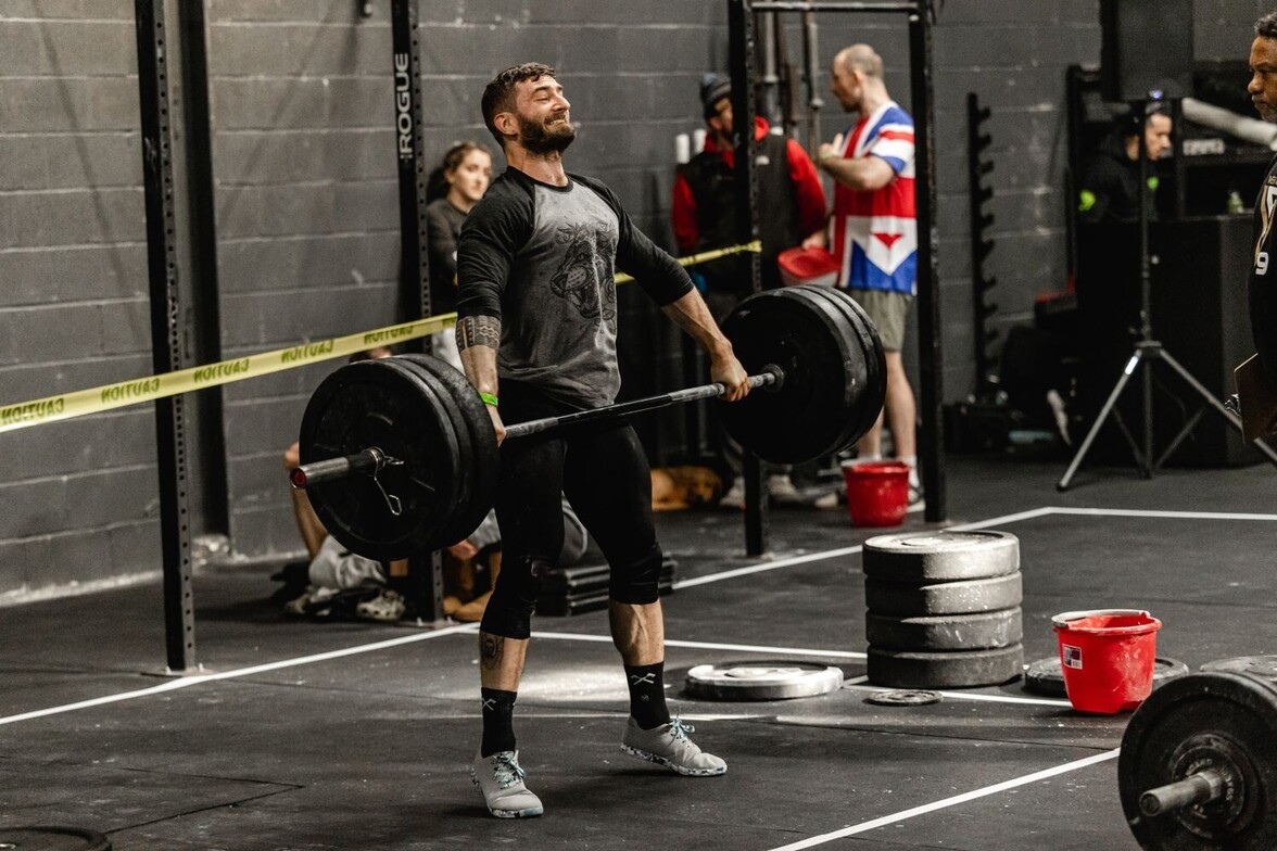 Male CrossFit athlete performing a snatch.