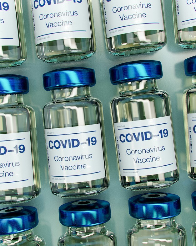 vials with covid 19 tag on them