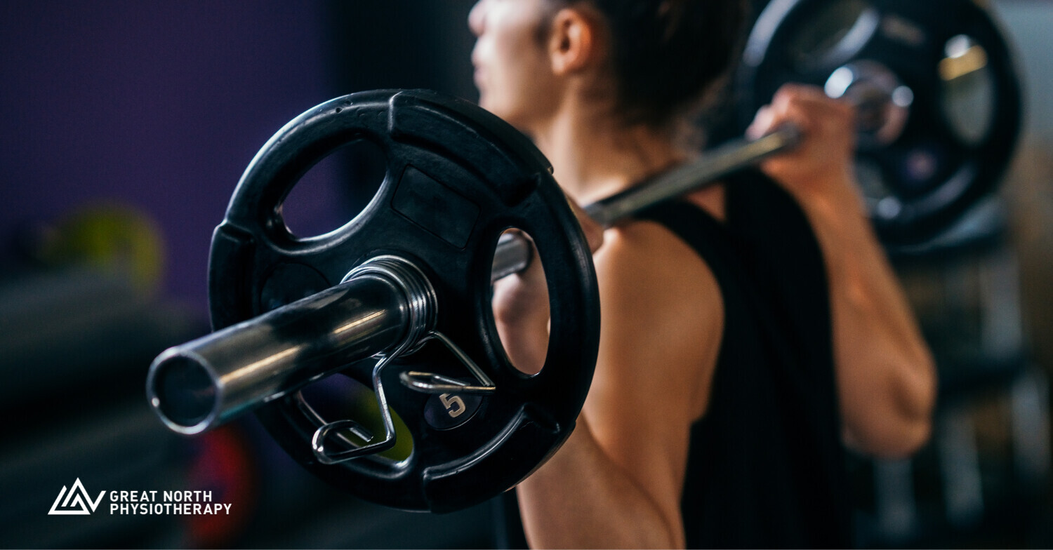 Athlete performing barbell squat exercise for strength training and injury prevention