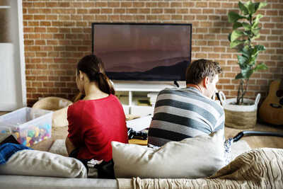 Family Fighting, Two people sitting on couch not looking at eachother, Therapy, Help
