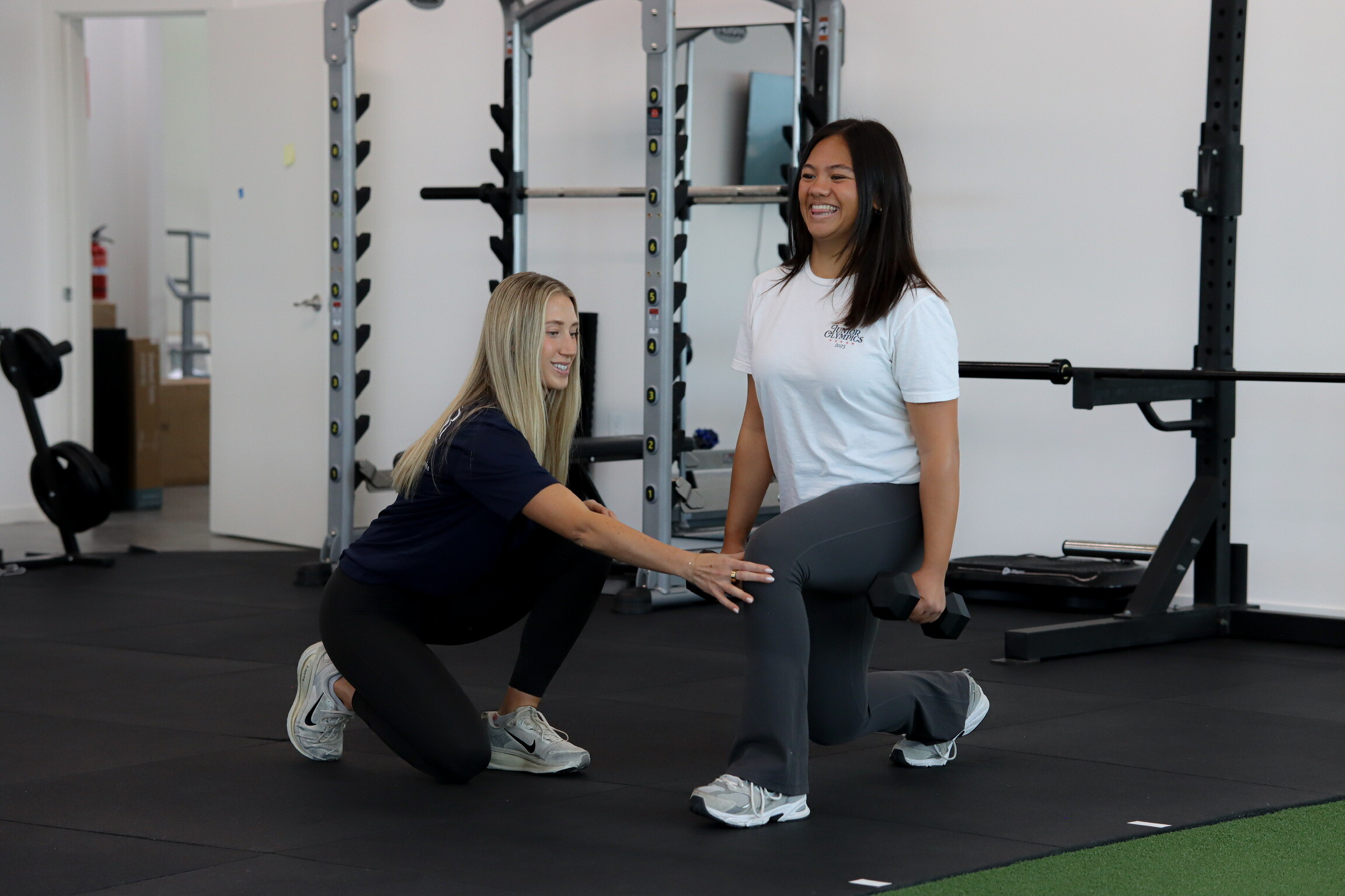 therapist working one-on-one with a patient during a physical therapy session