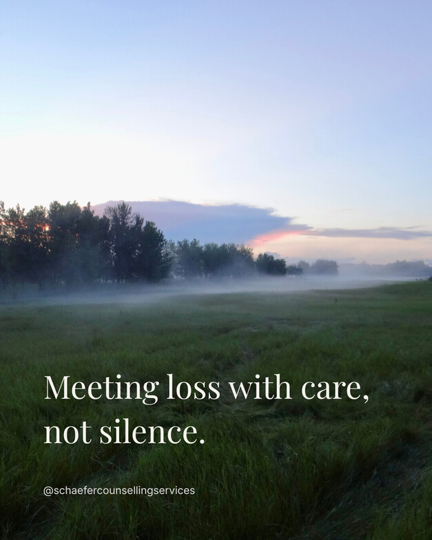 Fog rolling over a quiet open field at sunset with soft warm light on the horizon.