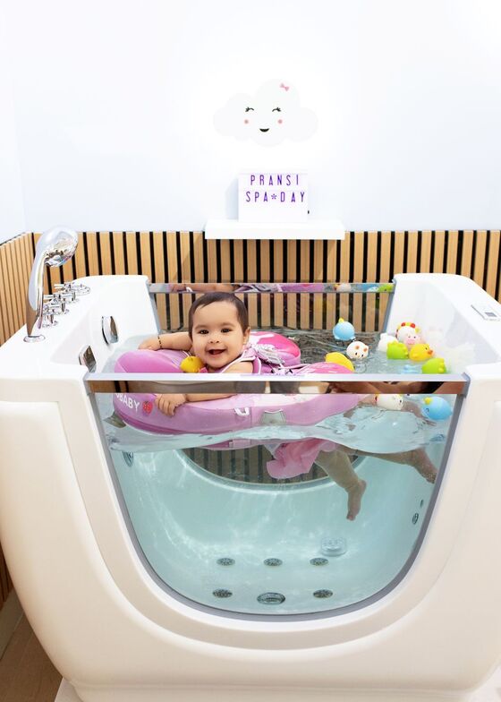 Baby enjoying hydrotherapy at Dolphin Dive Baby Spa in London, Ontario
