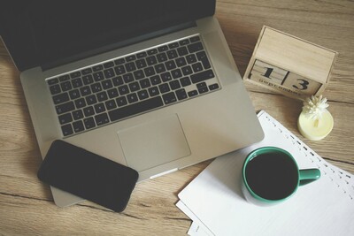 laptop mug and phone