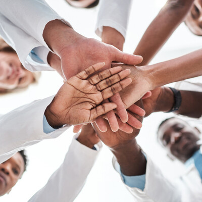 Medical providers leading a support group for commercial drivers focused on preventative care, wellness coaching, weight loss, and DOT physical exams near Stanly County NC at Bella Medical Associates.