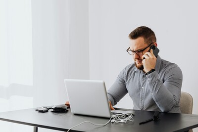 a gentleman on the phone 