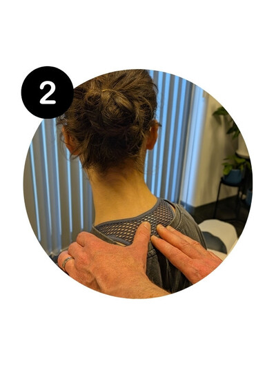 A chiropractor performing a personalised neck and shoulder assessment on a patient at Handsworth Chiropractic Clinic.