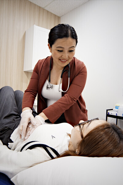  Naturopathic Doctor conducting health assessment