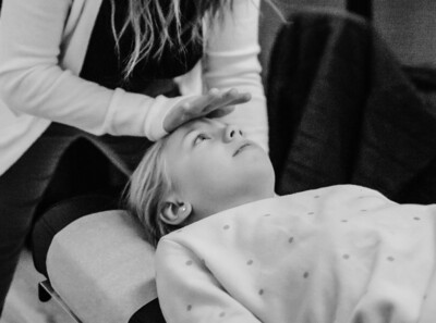 Patient receiving cranial soft tissue work.