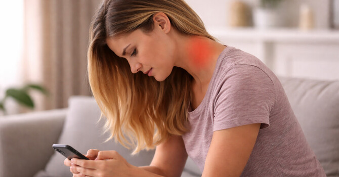 Why Looking Down at Your Phone Is Causing Your Neck Pain image