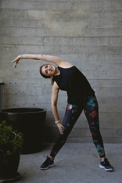 lady performing side stretches
