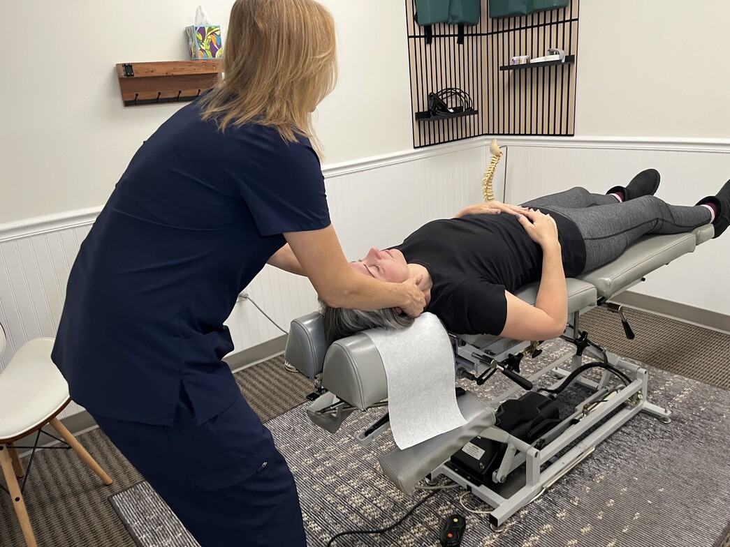 Chiropractor Adjusting a Patient