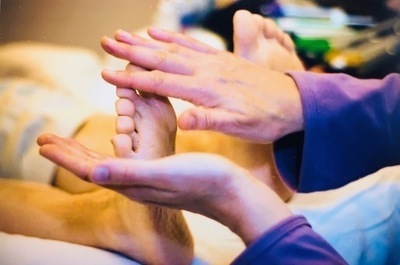 Ariane Wlasak providing a reflexology treatment to her client Judy Dong at the Stress Management Center in Larkspur, California, in 2009.