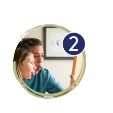Child practicing nasal breathing with myofunctional therapist during personalized orofacial myofunctional therapy