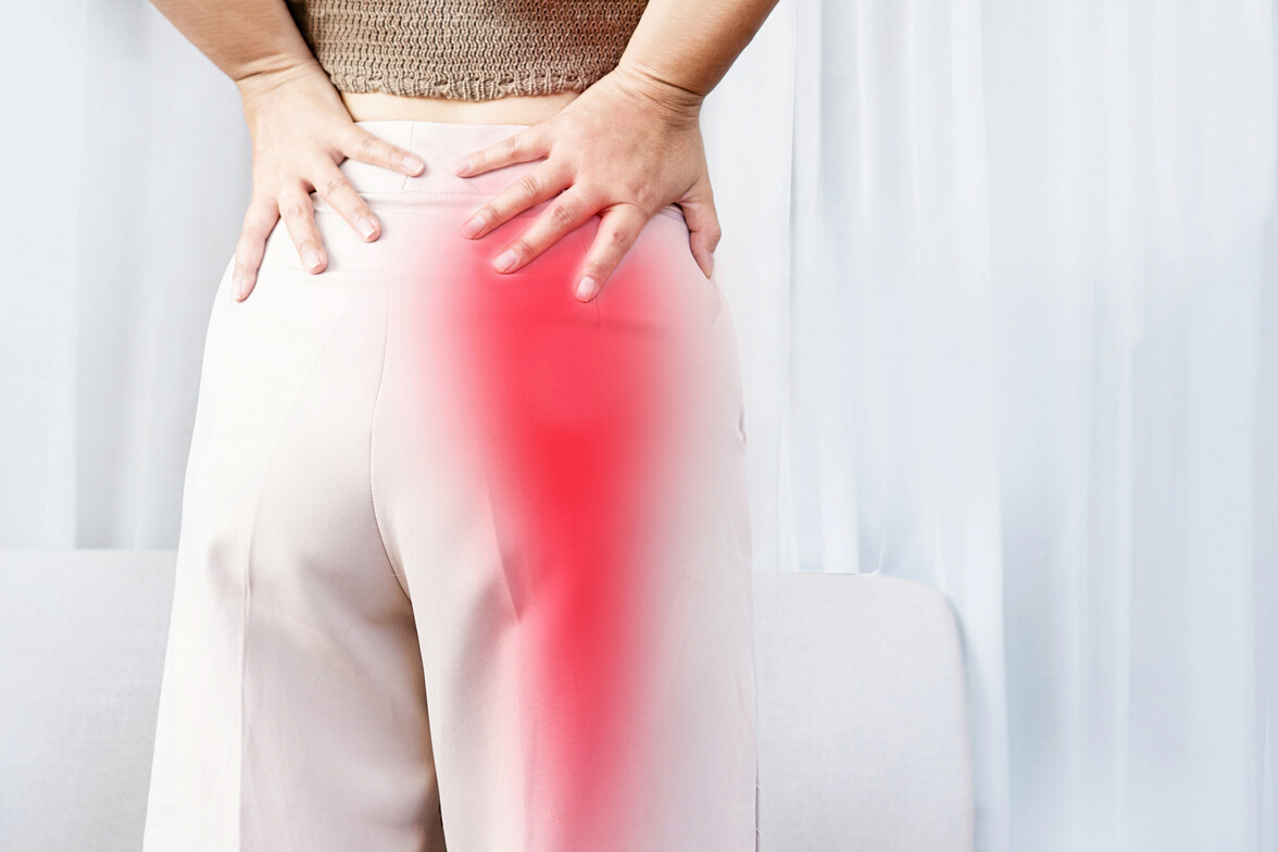 Patient receiving gentle chiropractic adjustment for sciatica treatment in Waukee, IA at Core Chiropractic on Hickman Road