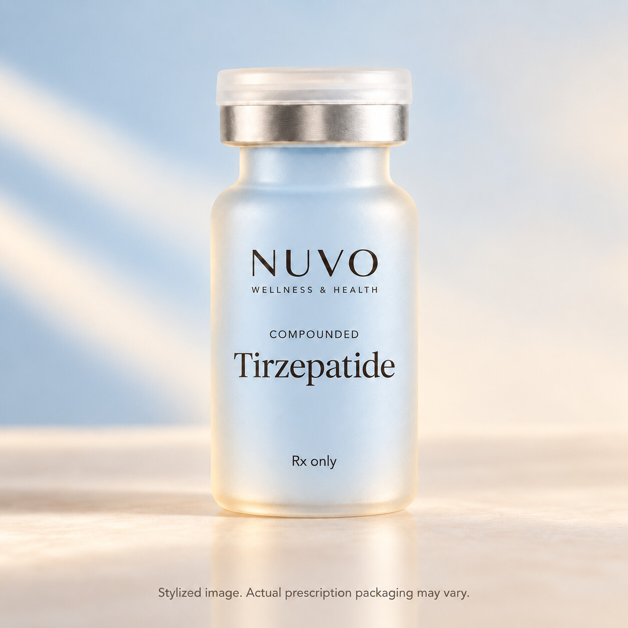 Stylized Nuvo compounded Tirzepatide vial in powder blue and champagne