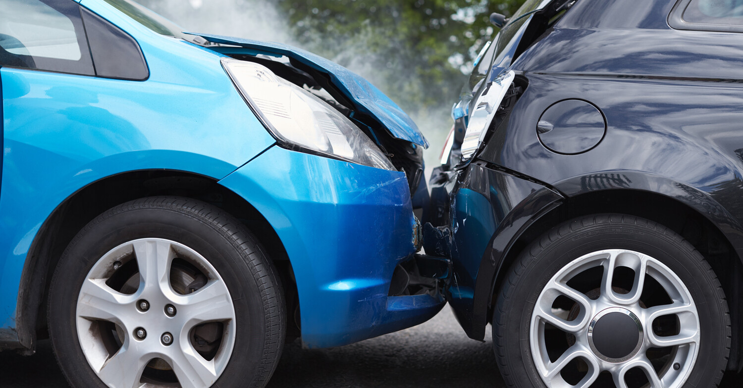 Chiropractor evaluating a patient after a motor vehicle accident Chiropractic examination for neck and back pain after a car accident