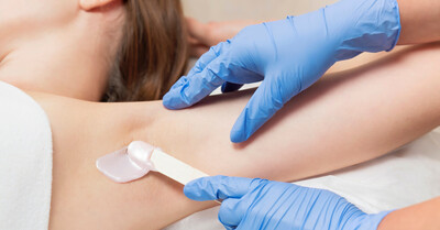 Waxing  an underarm