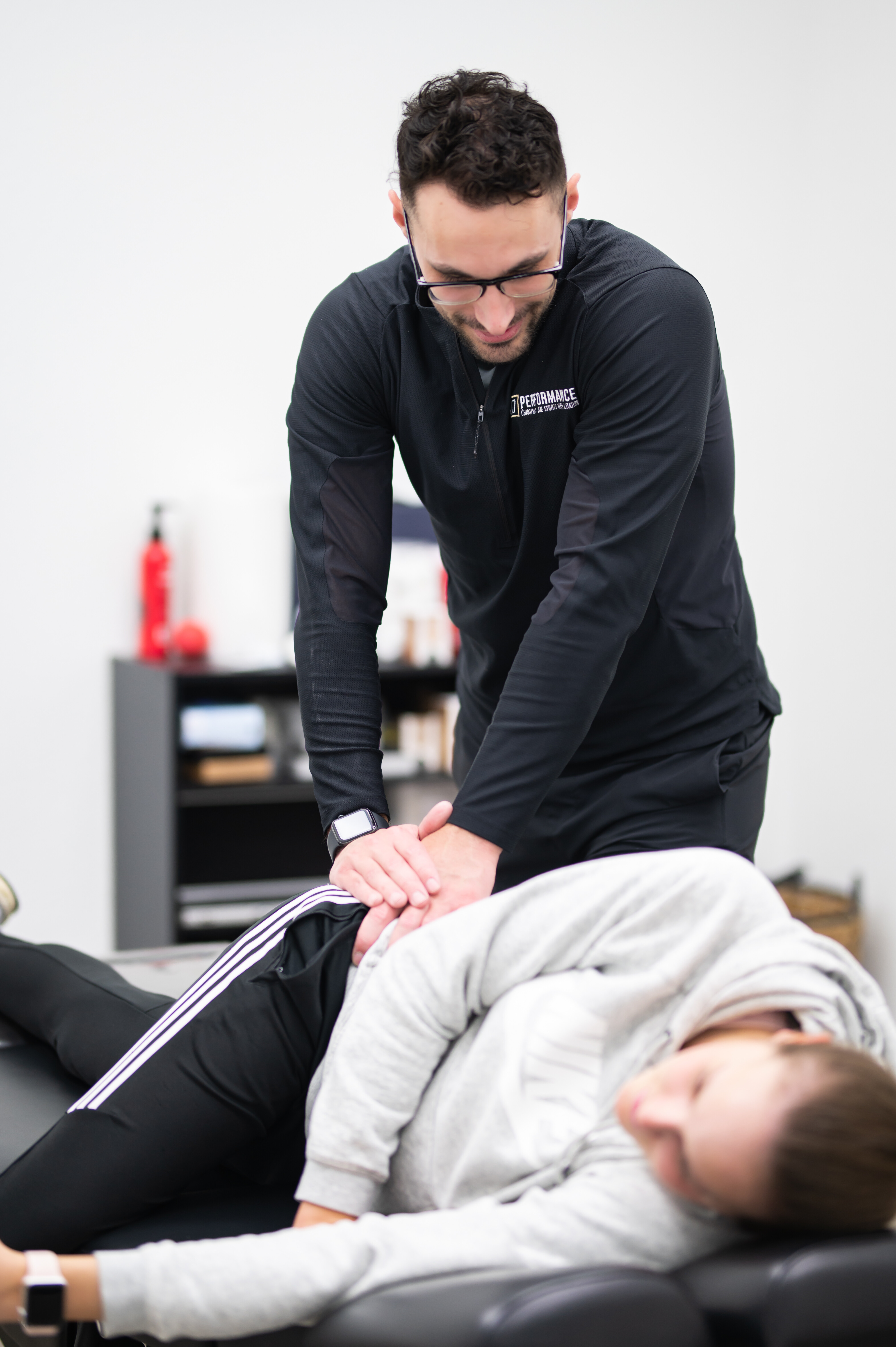 Runner undergoing a functional movement assessment at a sports rehabilitation clinic in Springfield, MO