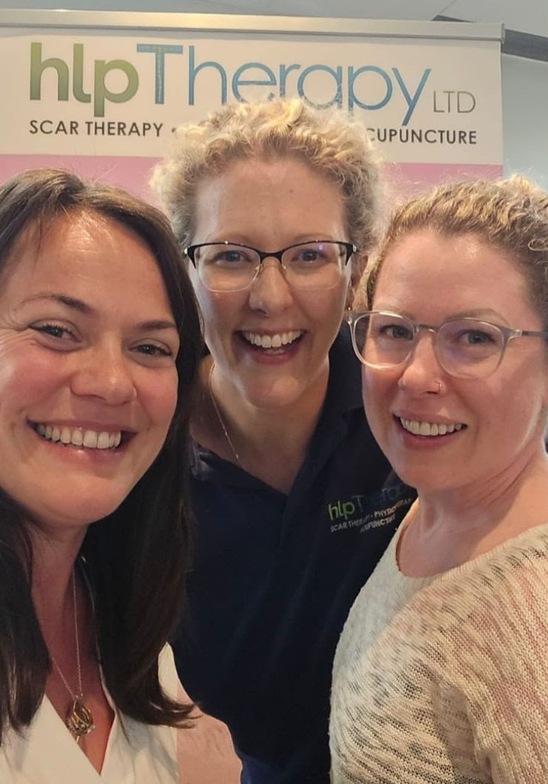 Cheryl smiles at the camera along with Hannah of HLP Therapy, and her colleague Michelle