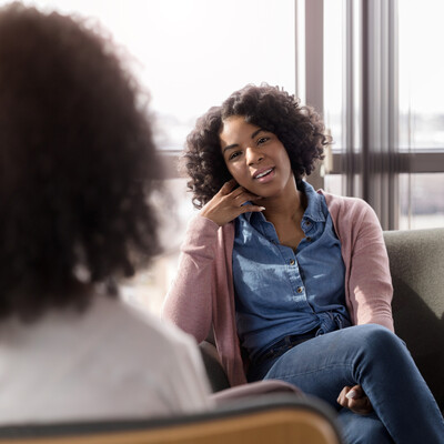Woman talking with a counsellor in a calm office